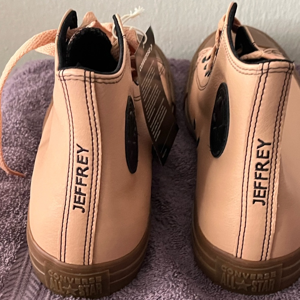 Customized All Star Converse with Jeffrey embroidered on the back.